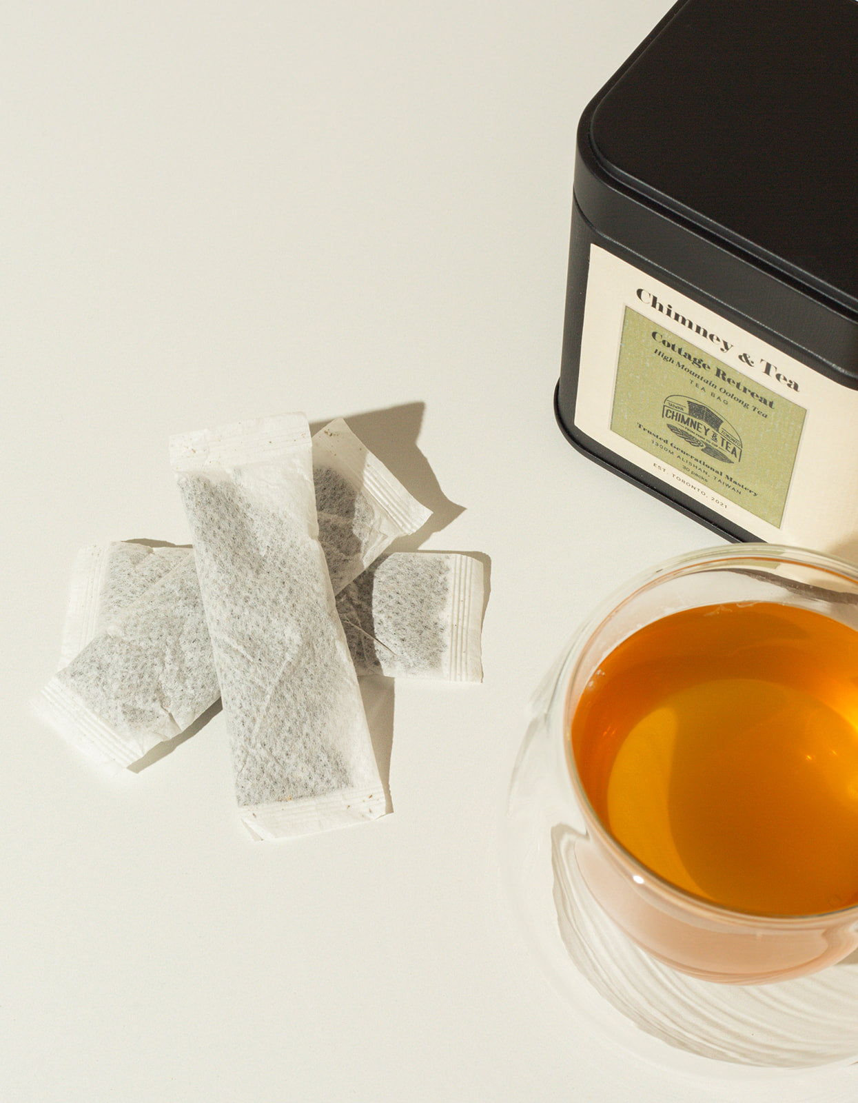 Cottage Retreat Oolong Tea tin packaging with tea bags